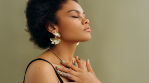 Calm and relaxed woman using techniques to manage and stop feeling overwhelmed