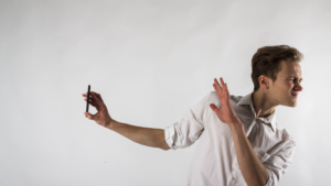Person experiencing emotional avoidance during therapy session